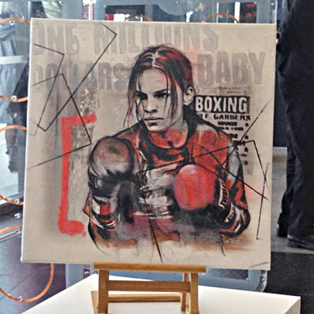Tableau représentant une boxeuse en action réalisé en technique mixte format 60 × 60 cm par l’Atelier Esther